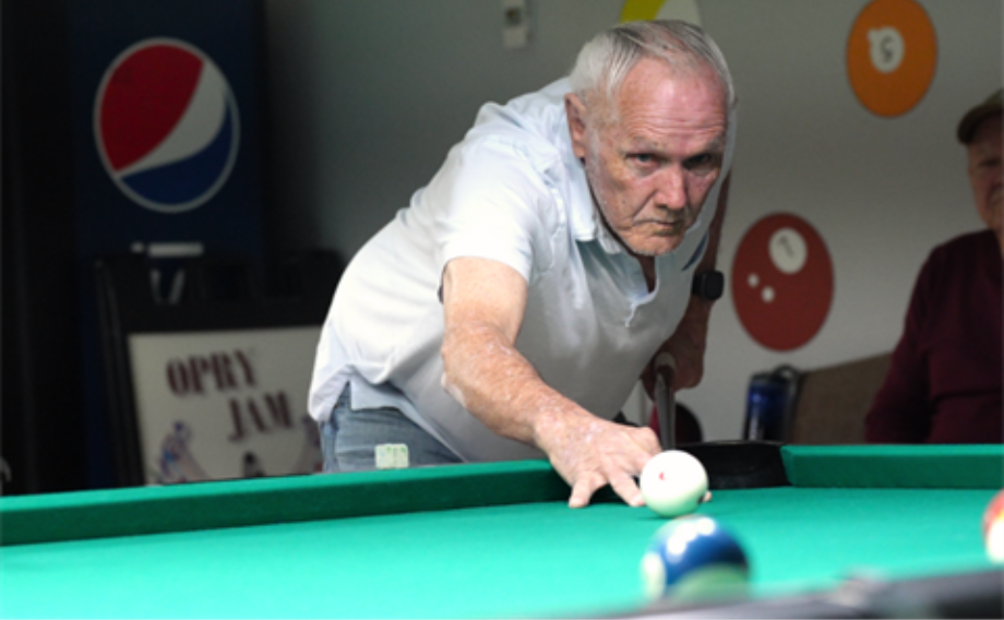Steve W. playing pool at senior center