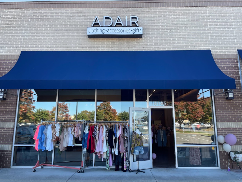 Adair storefront showing blue canopy and windows